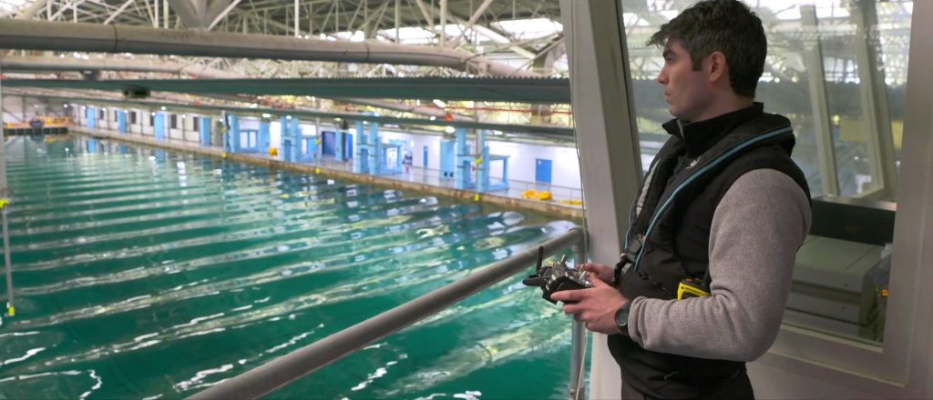 Engineer controlling a remote-control free-running model. 